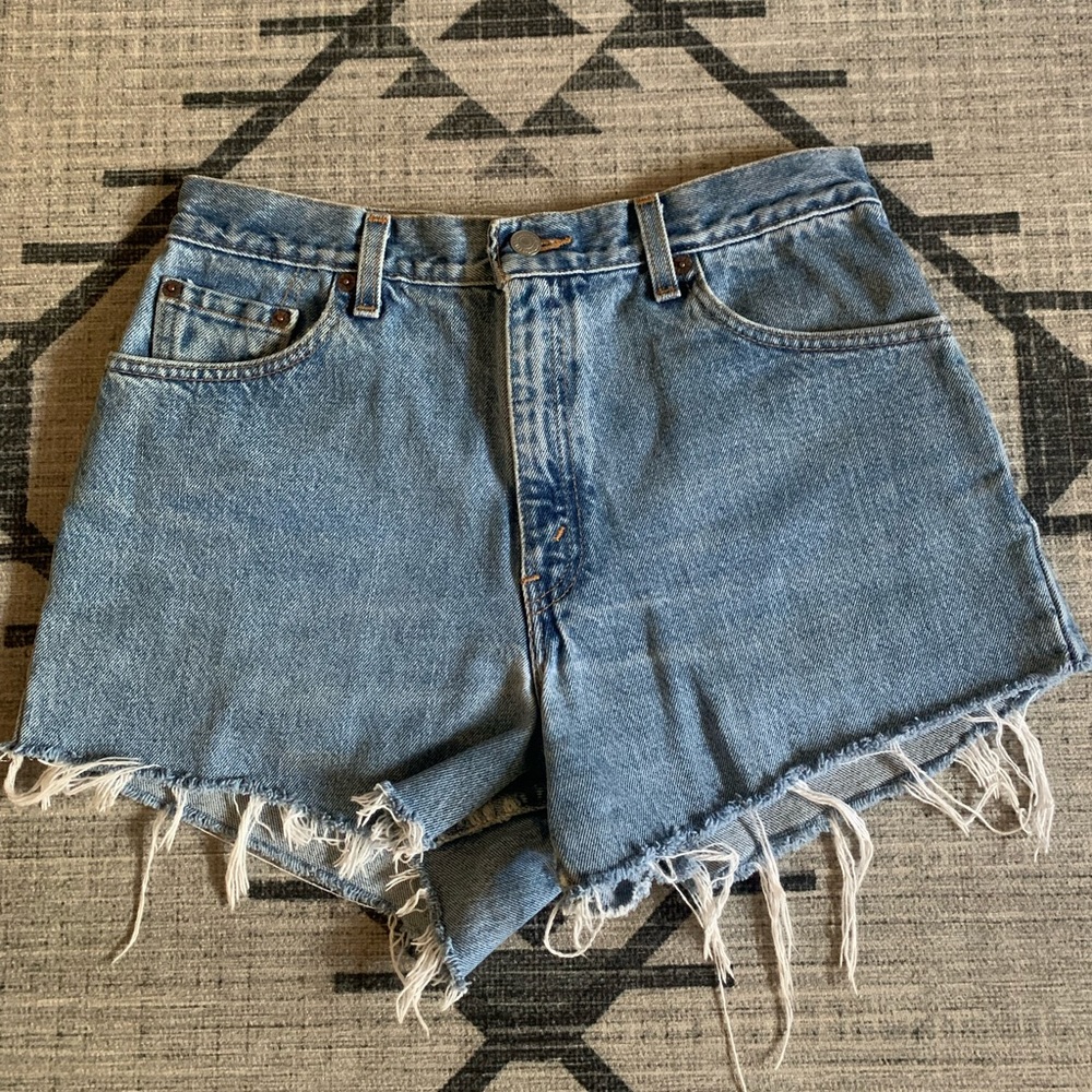 Levi 550 distressed high waisted shorts
